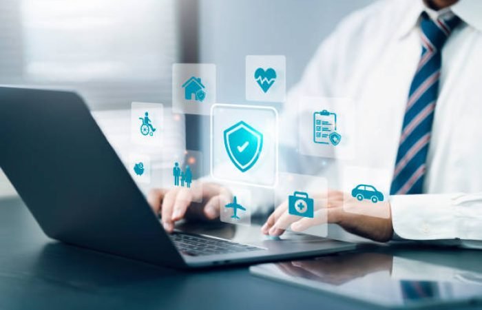 insurance concept. Businessmen use a computer for insurance online for life, family, financial, and health insurance. accident insurance for car or travel.